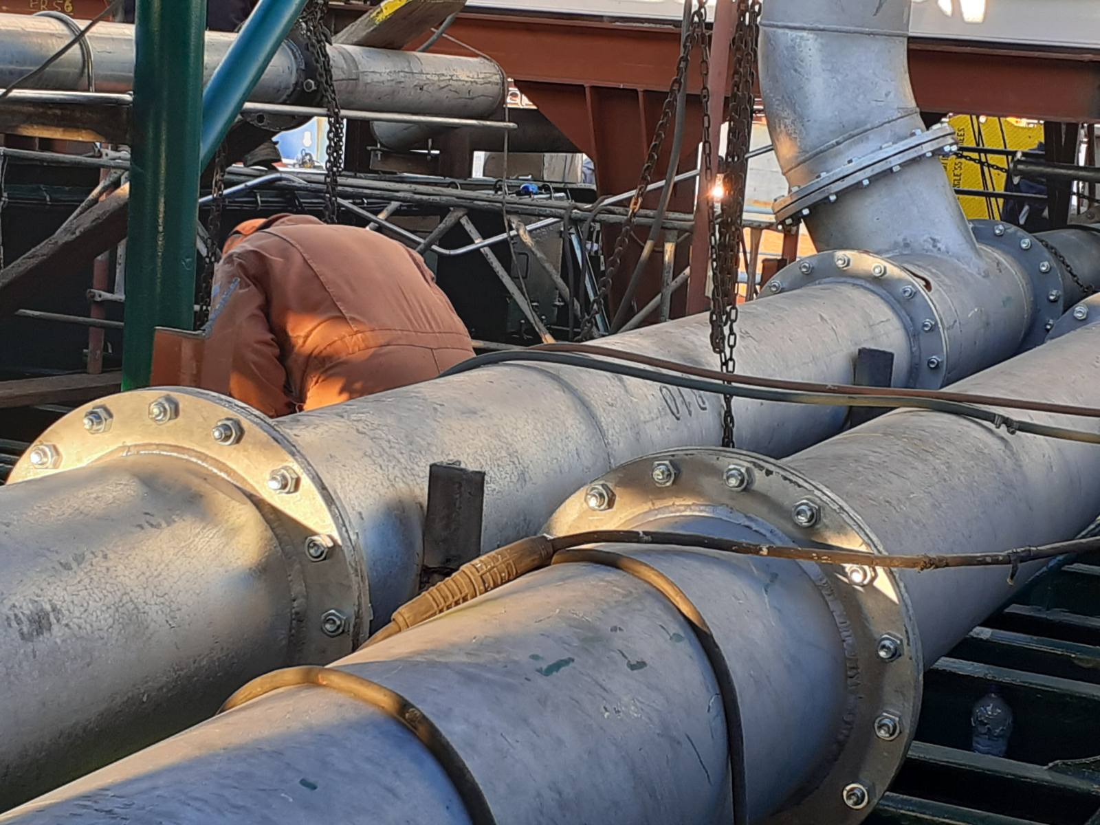 Installation and alignment of large-diameter marine piping onboard a vessel